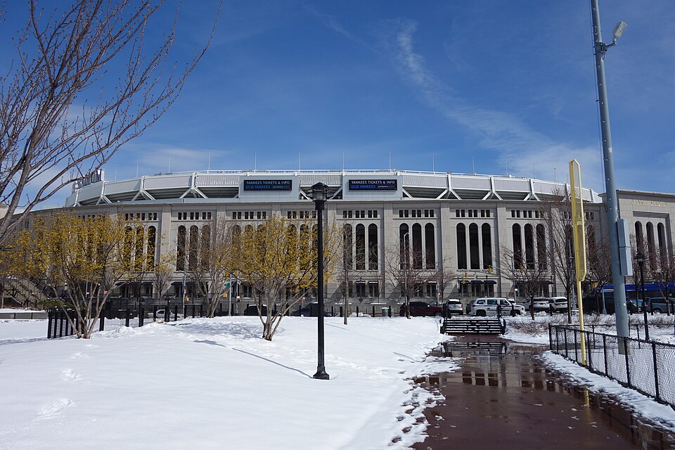 Yankee Stadium approach from 161st Street in the Bronx, showing the street-level arrival view near the stadium