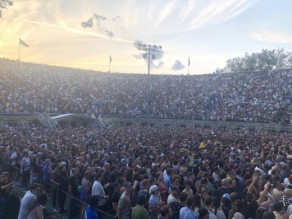 Live concert crowd at Forest Hills Stadium in Queens, showing the open-air atmosphere and scale of a summer music event
