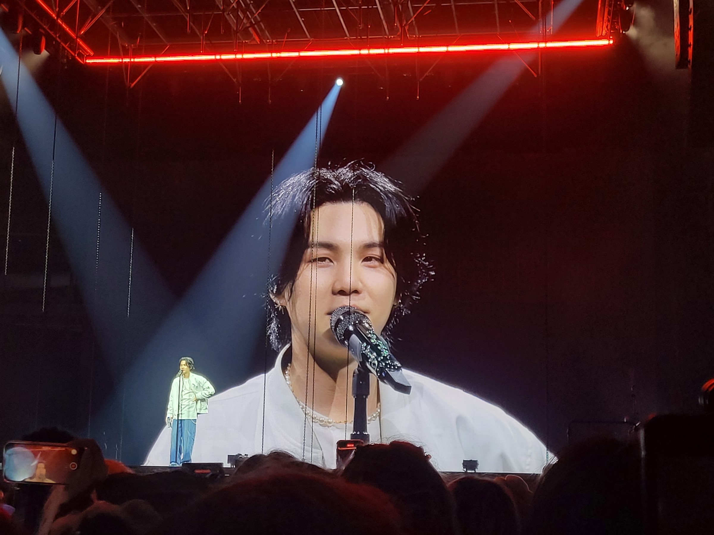 Live concert inside UBS Arena in Elmont, showing the scale, lighting, and atmosphere of a major arena performance