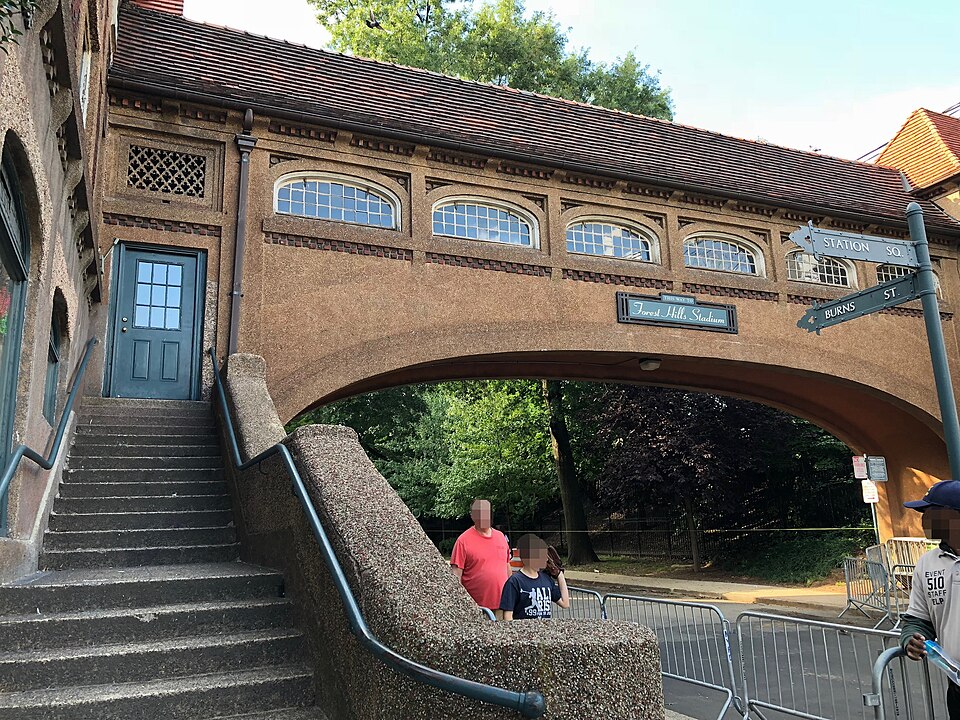 The walk from Forest Hills Station Square to Forest Hills Stadium, a key arrival path for concert nights