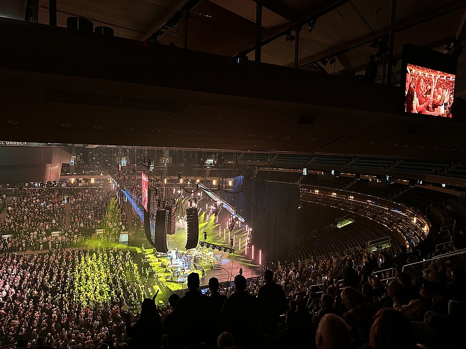 Concert performance inside Madison Square Garden in New York City, showing the scale and atmosphere of a major arena show
