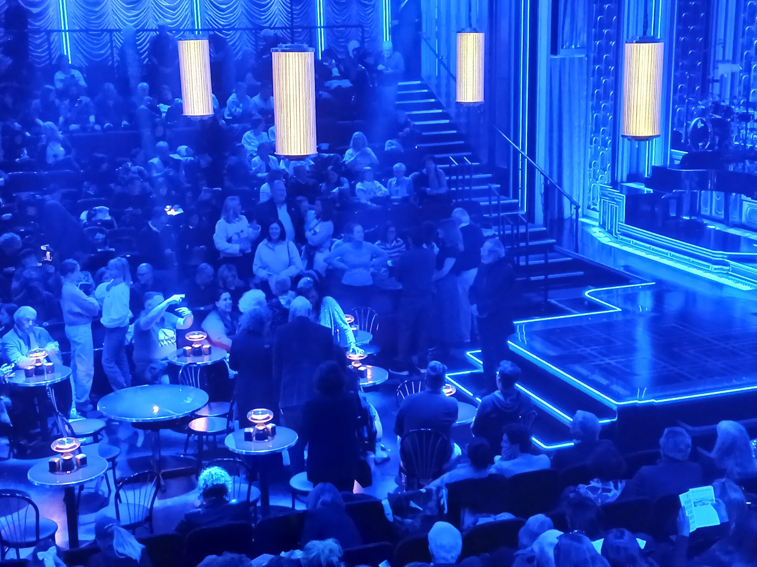 Interior seating view of Circle in the Square Theatre with table seating and thrust-stage layout for Just in Time on Broadway