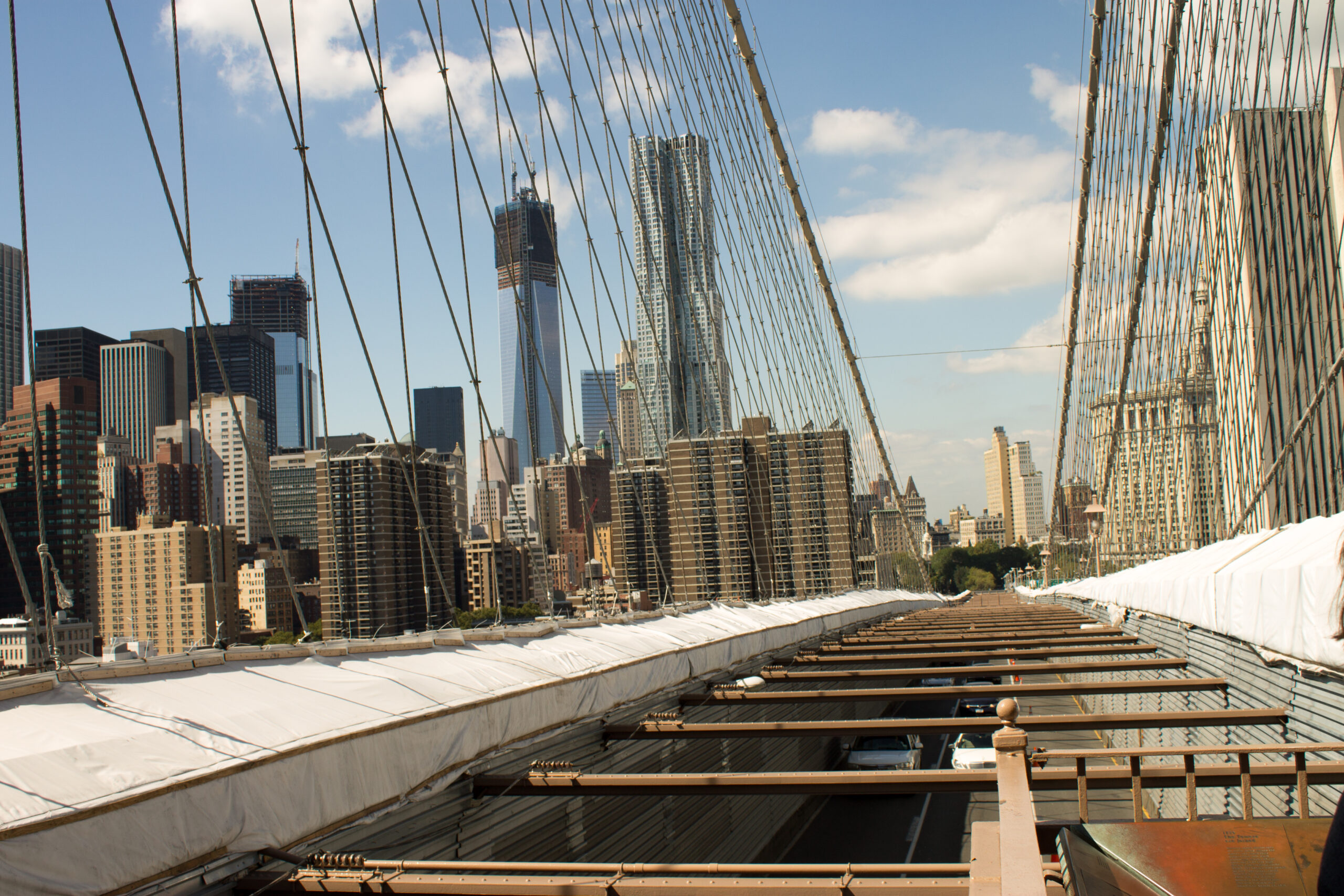 Brooklyn Bridge spanning the East River with the Lower Manhattan skyline in New York City