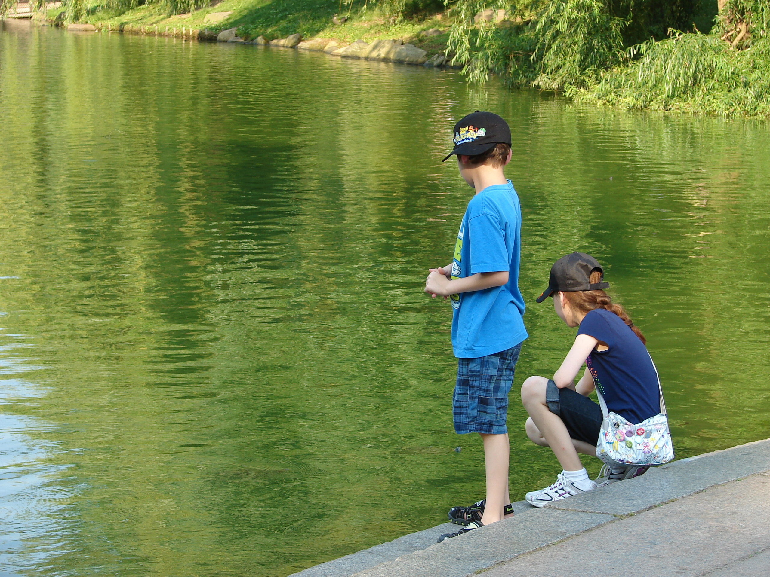 Children by the Lake in Central Park, a family-friendly New York City activity for kids.