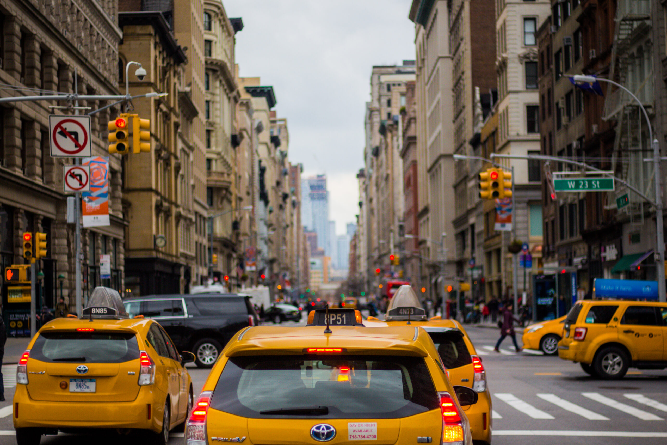 Yellow cabs in New York City for comparing taxis, Uber, and Lyft transportation options