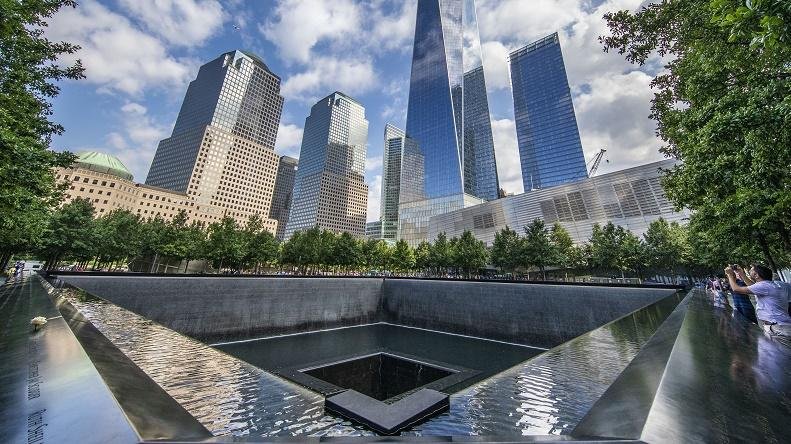 9/11 Memorial reflecting pool and Oculus at the World Trade Center in Lower Manhattan, NYC