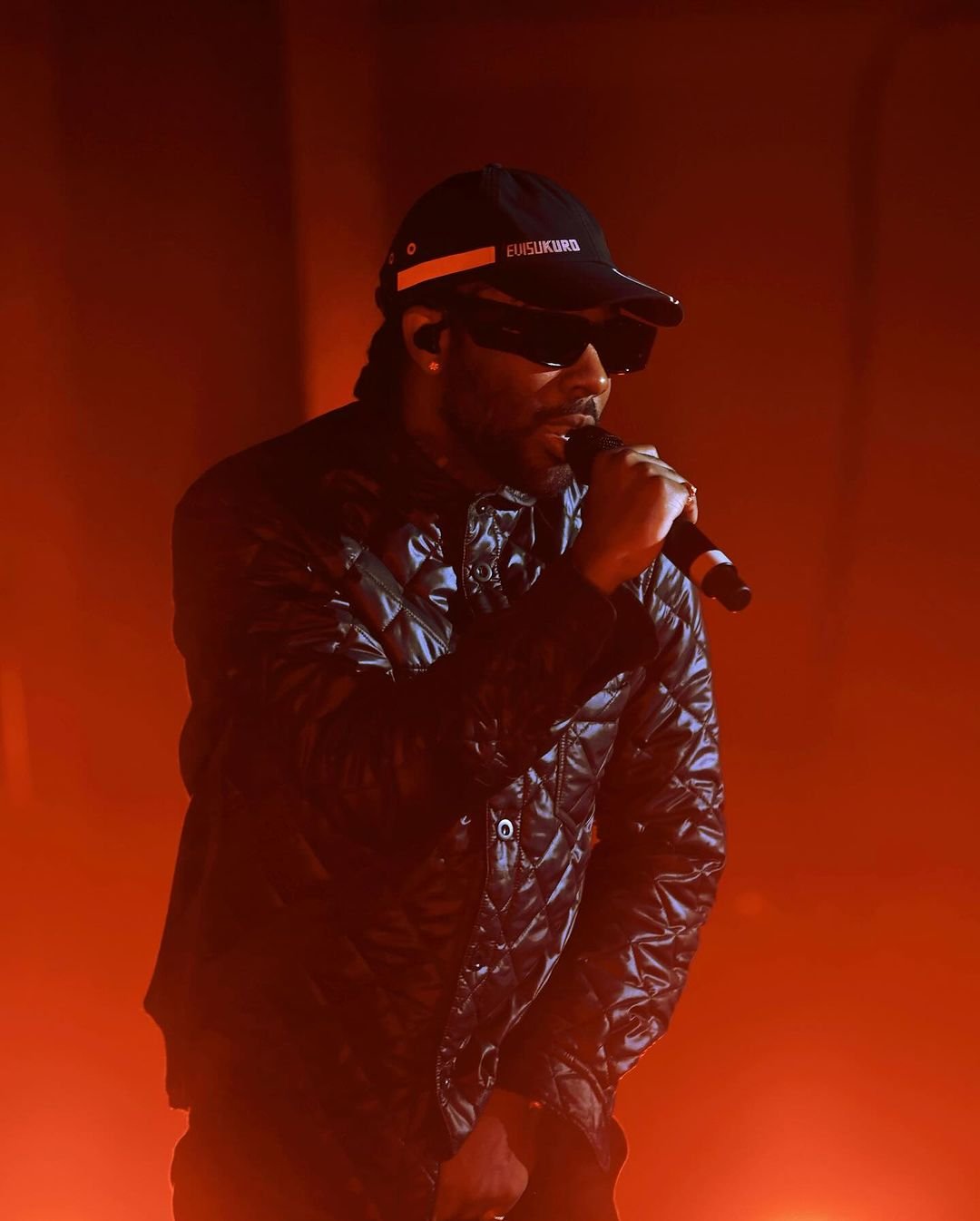 Brent Faiyaz performing live on stage during a concert