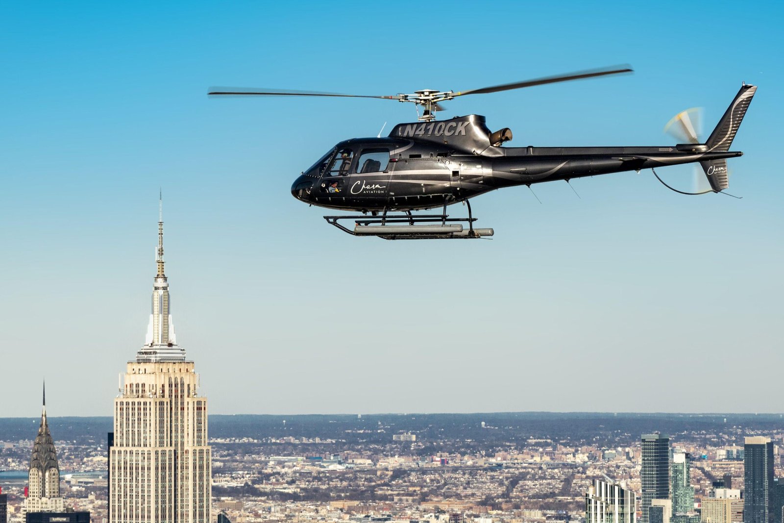Aerial views of Lower Manhattan and New York City landmarks from a helicopter sightseeing tour