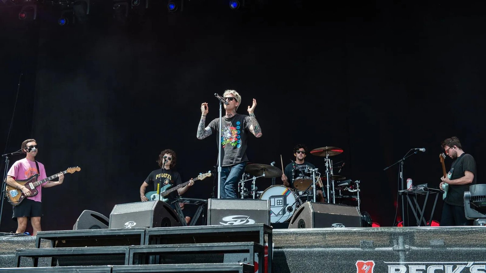 The Neighbourhood band performing live on stage at a concert