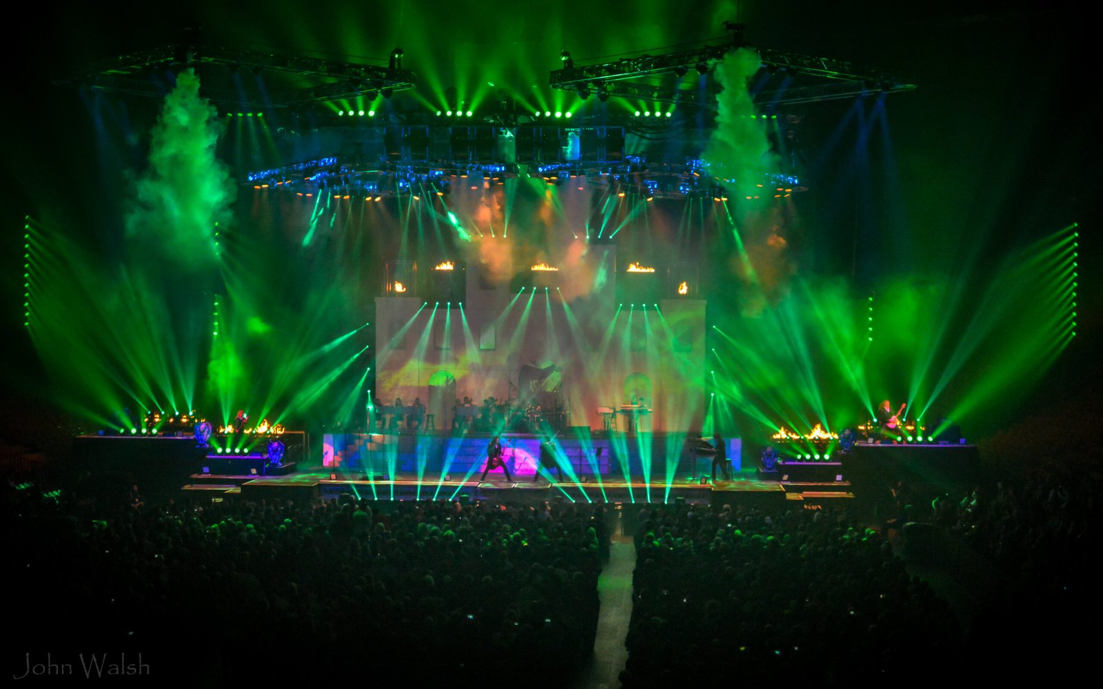 Trans-Siberian Orchestra performing live with dramatic stage lighting during a concert